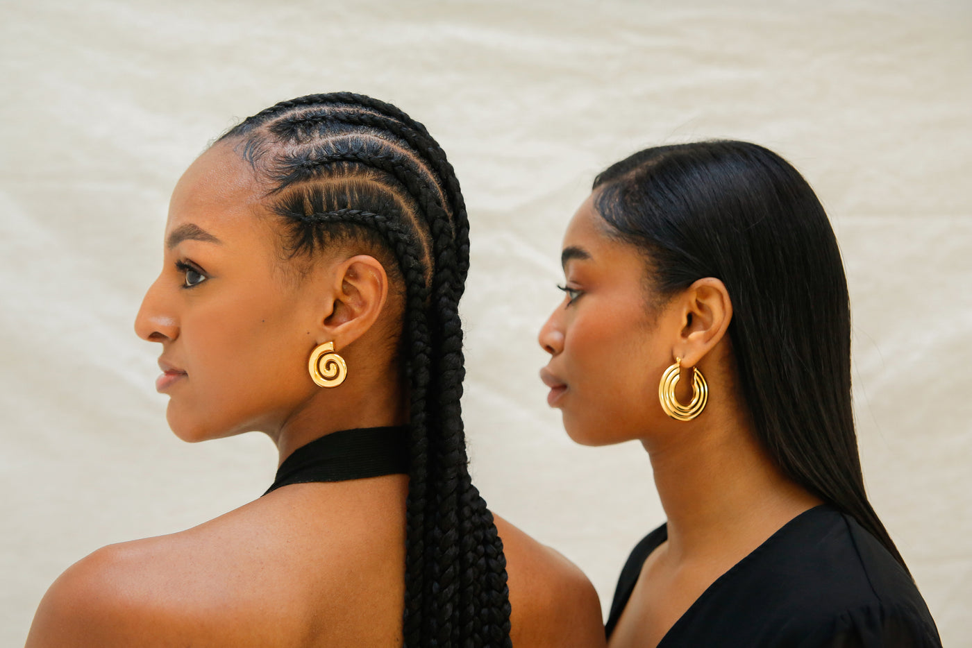 Ayele models wearing the fine jewelry earrings